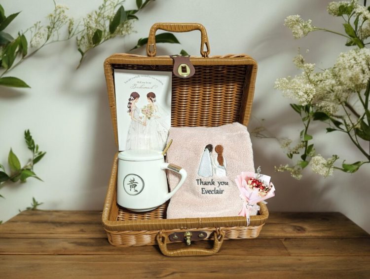 Ultimate Bridesmaid Boomerang: The Perfect Gifting Guide from KnotiQift 1 a wicker suitcase filled with wedding items