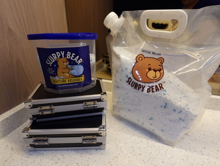 a plastic bag of white stuff next to slurpy bear products