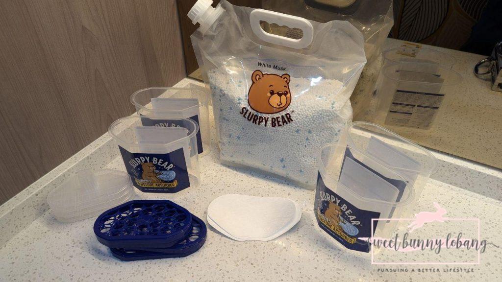 a bag of white stuff and a few plastic containers of slurpy bear 