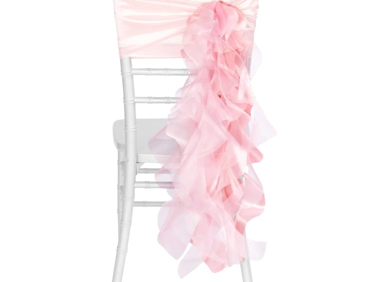 Affordable Wedding Centerpieces That Still Look Elevated 1 a white chair with a pink ruffled chair cover